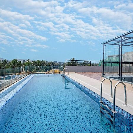 Super Townhouse Oak Hillside Aqua Hotel Khandagiri Bagian luar foto
