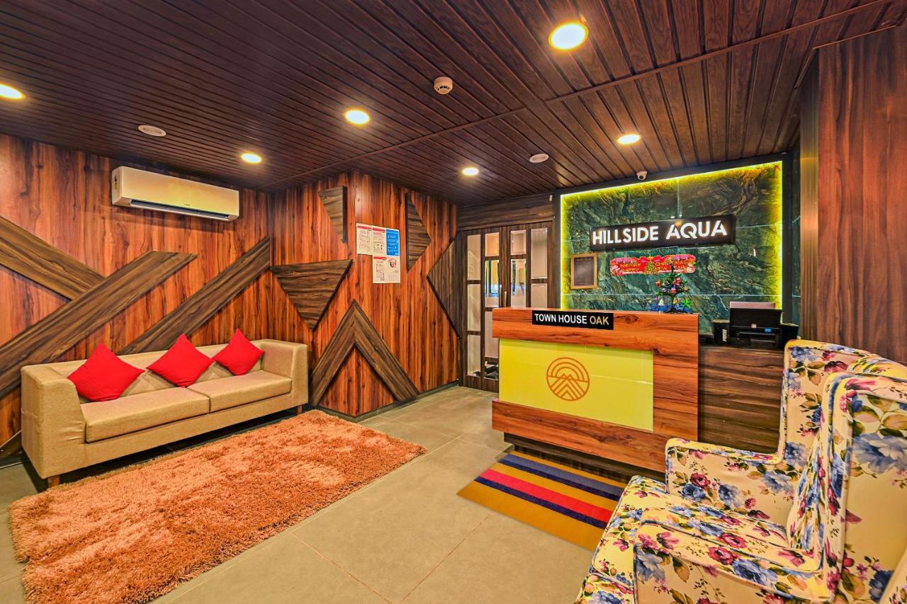 Super Townhouse Oak Hillside Aqua Hotel Khandagiri Bagian luar foto