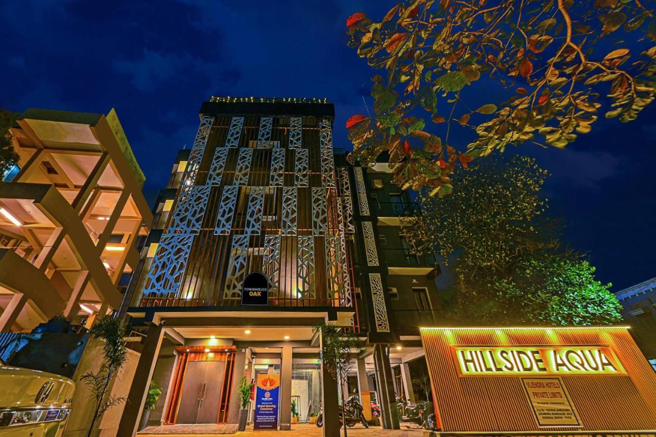 Super Townhouse Oak Hillside Aqua Hotel Khandagiri Bagian luar foto
