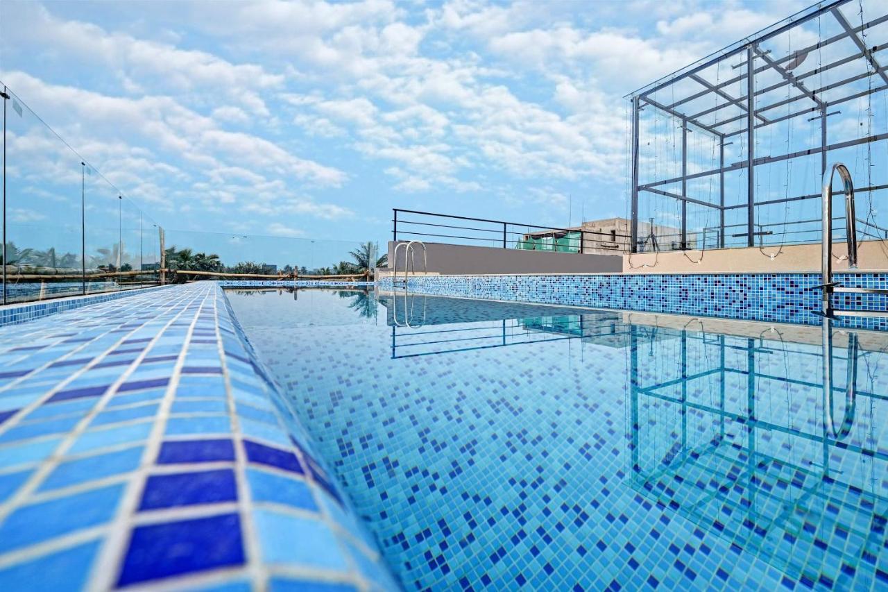 Super Townhouse Oak Hillside Aqua Hotel Khandagiri Bagian luar foto