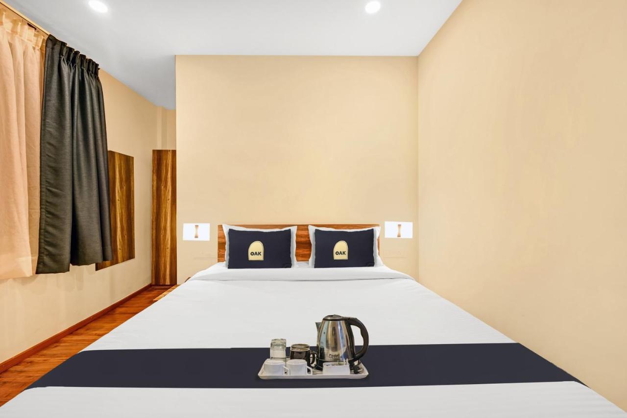 Super Townhouse Oak Hillside Aqua Hotel Khandagiri Bagian luar foto