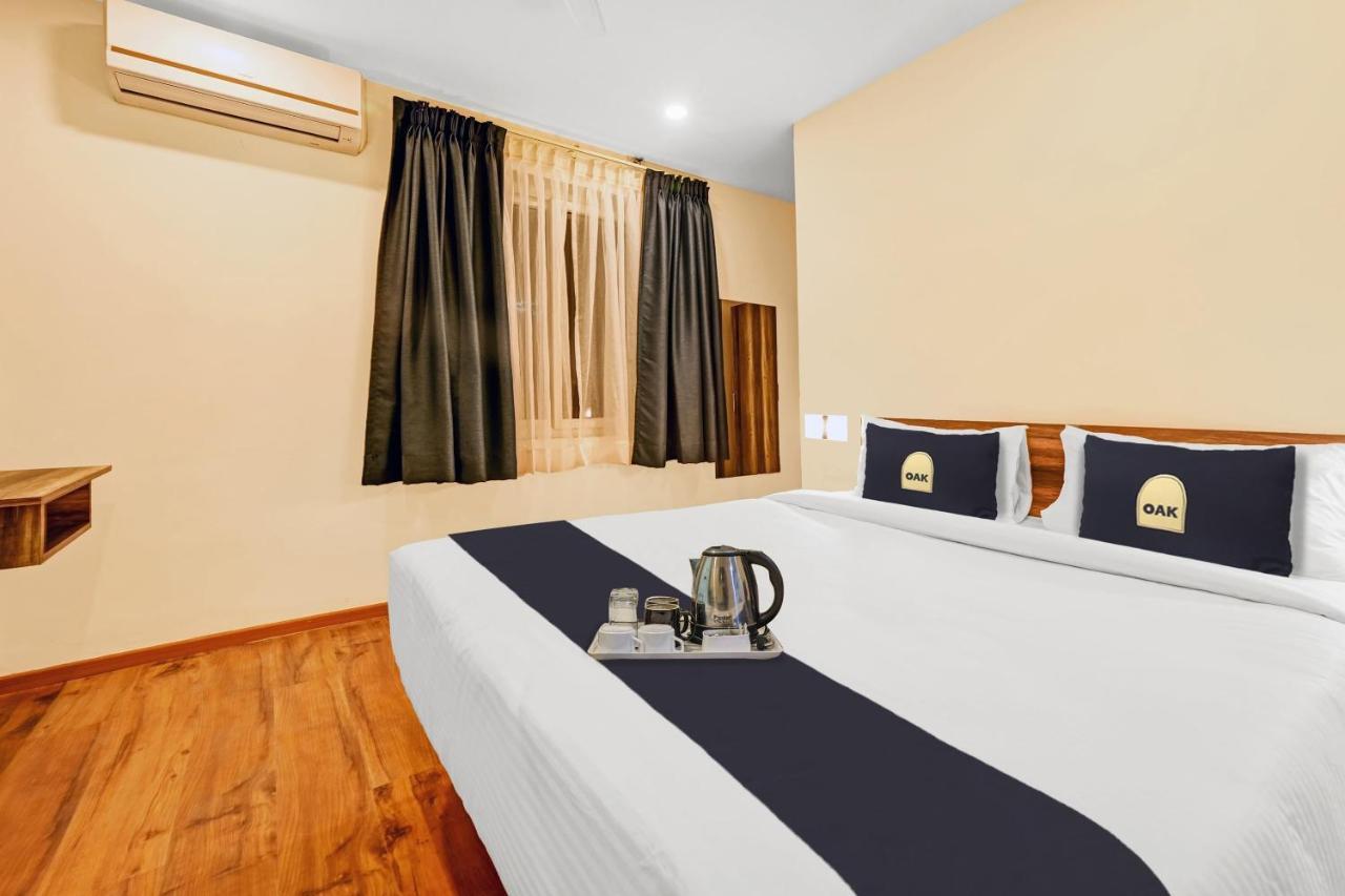 Super Townhouse Oak Hillside Aqua Hotel Khandagiri Bagian luar foto